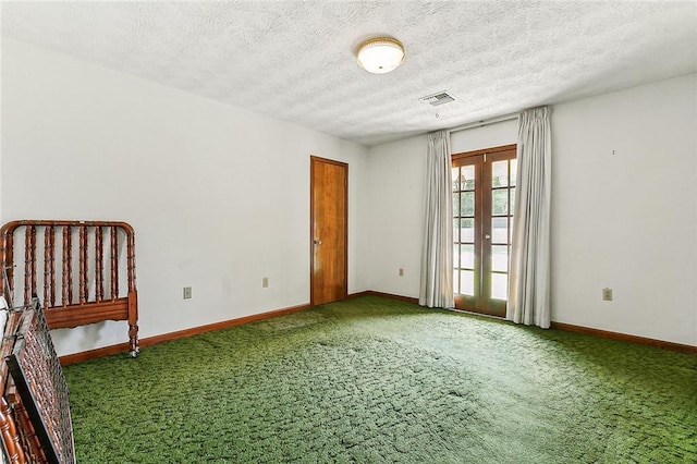 116 Villary St, Belle Chasse, LA 70037 - empty room featuring carpet, baseboards, and a textured ceiling
