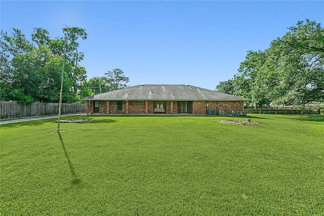 116 Villary St, Belle Chasse, LA 70037 - back of house with brick siding