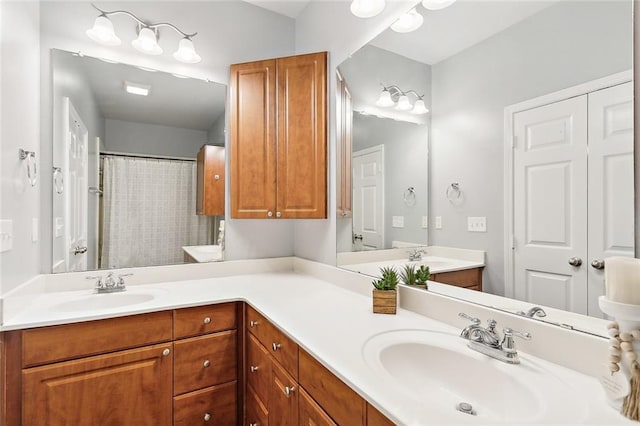 bathroom featuring vanity and walk in shower