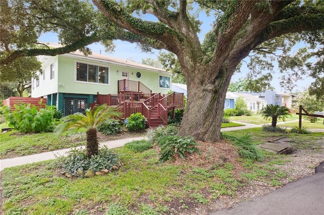 view of front of house featuring a deck