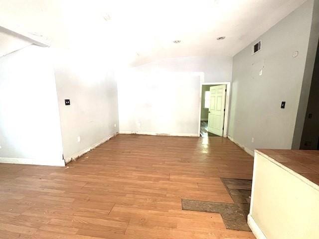 spare room featuring light wood-type flooring