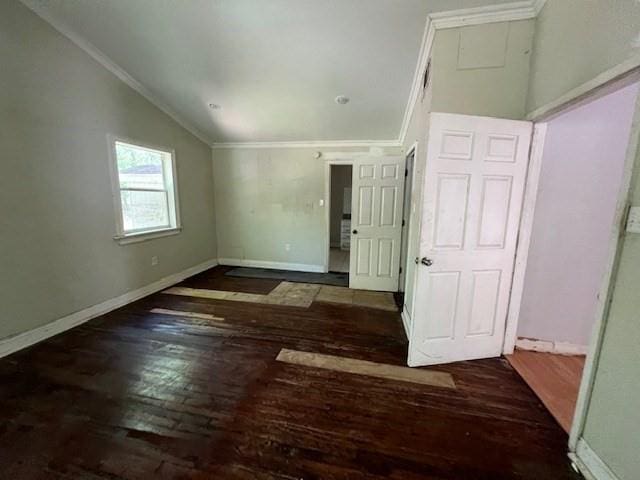 interior space with wood-type flooring and vaulted ceiling