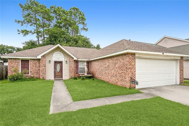 ranch-style house with a garage and a front yard