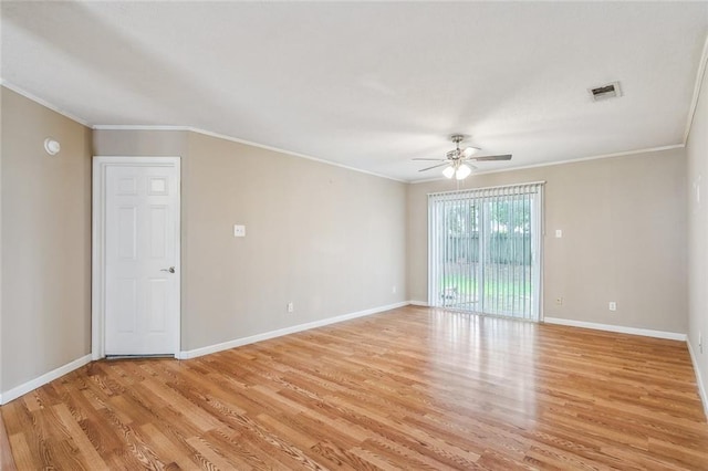 unfurnished room with ornamental molding, light hardwood / wood-style floors, and ceiling fan