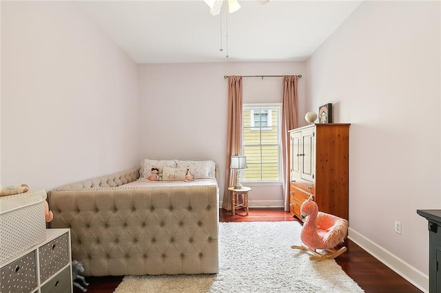 bedroom with hardwood / wood-style flooring and ceiling fan