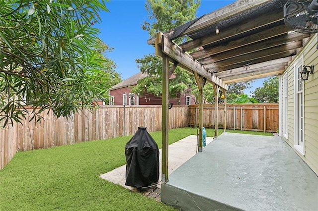 exterior space featuring a fenced backyard and a pergola