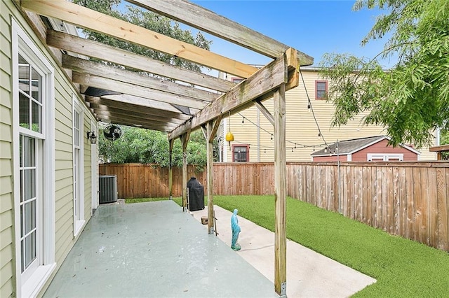 view of patio / terrace featuring a pergola and central AC unit