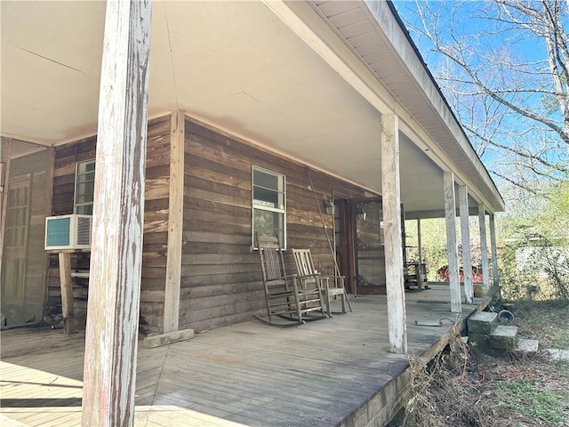 wooden deck featuring covered porch