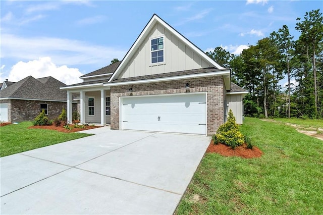 view of front of house with a garage and a front yard