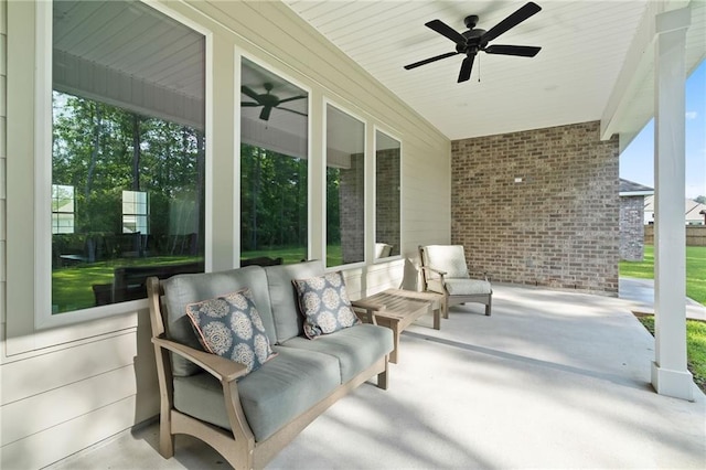 view of patio / terrace featuring a ceiling fan and an outdoor living space