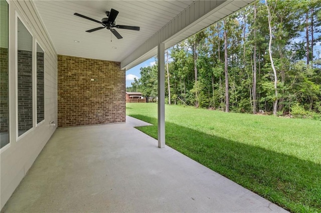 view of patio featuring ceiling fan