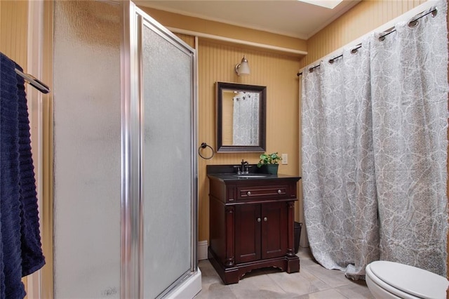 bathroom with an enclosed shower, vanity, tile patterned flooring, and toilet