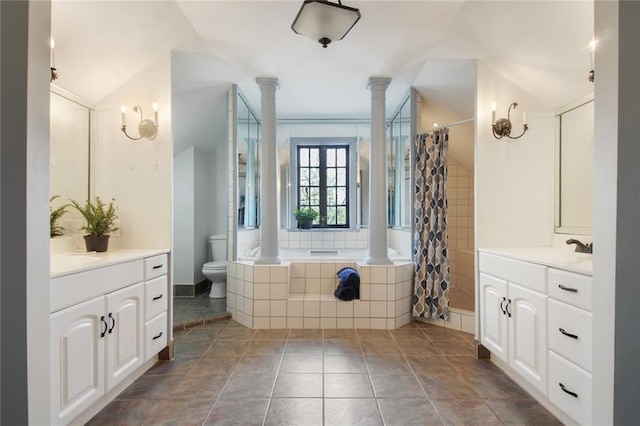 full bathroom with ornate columns, vaulted ceiling, tile patterned flooring, and toilet