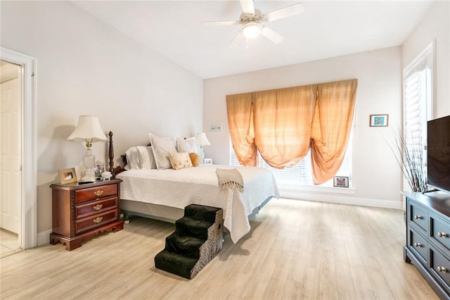 bedroom featuring ceiling fan and light wood-type flooring