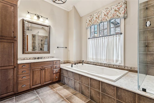 bathroom featuring independent shower and bath, crown molding, tile patterned flooring, and vanity