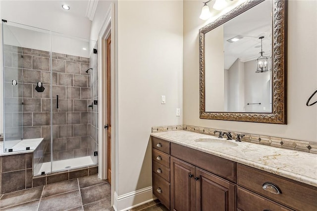 bathroom featuring vanity, tile patterned flooring, and walk in shower