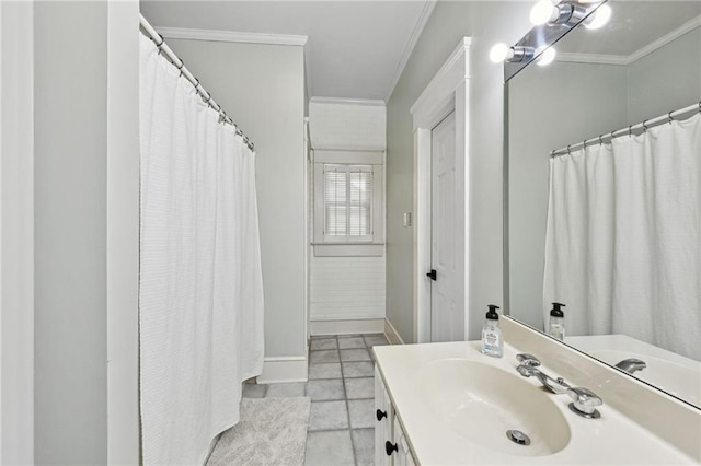 bathroom with vanity, tile patterned flooring, and ornamental molding