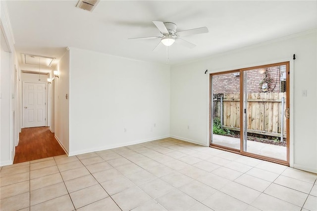 unfurnished room with light tile patterned flooring, ornamental molding, and ceiling fan