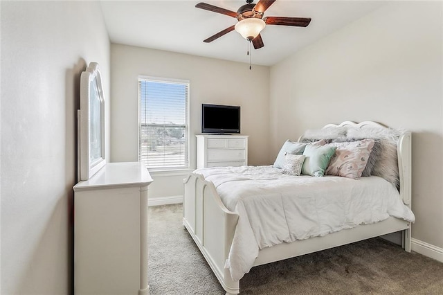 bedroom featuring ceiling fan and light carpet