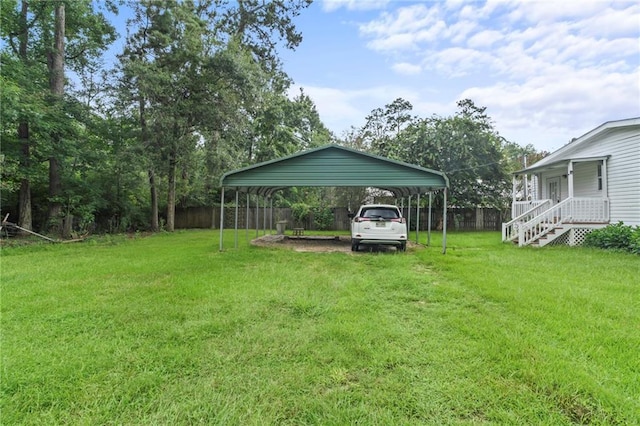 view of yard with a carport