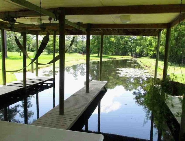 dock area featuring a water view