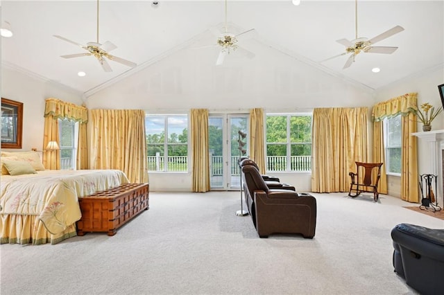 carpeted bedroom with access to outside, multiple windows, ornamental molding, and high vaulted ceiling