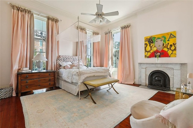 2027 Carondelet St, New Orleans, LA 70130 - bedroom with dark hardwood / wood-style flooring, crown molding, multiple windows, and a premium fireplace