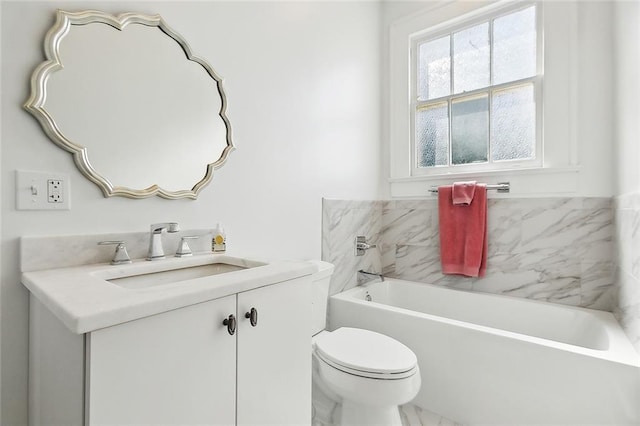 2027 Carondelet St, New Orleans, LA 70130 - bathroom with vanity, a washtub, and toilet