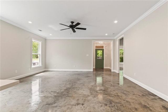 empty room with ornamental molding, concrete flooring, and ceiling fan