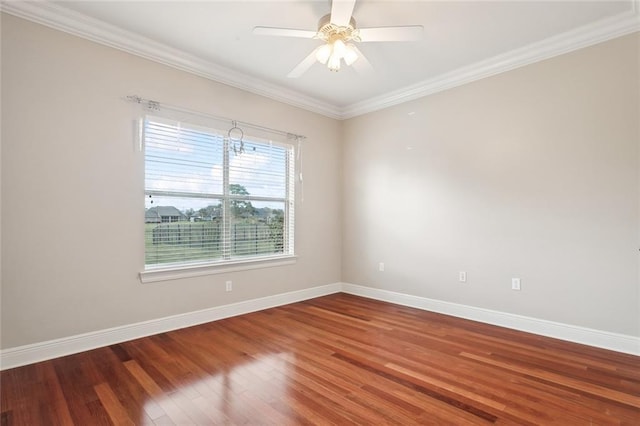 unfurnished room featuring hardwood / wood-style floors, ceiling fan, and crown molding