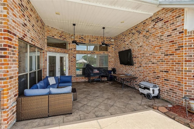 view of patio / terrace with ceiling fan, an outdoor hangout area, and french doors