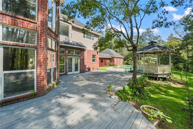 30 River Cypress Ln, Madisonville, LA 70447 - deck with a gazebo, french doors, and an outdoor pool