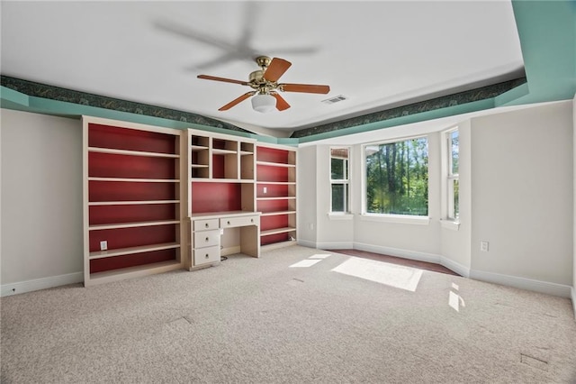 spare room with carpet and ceiling fan