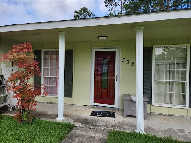 property entrance with a porch