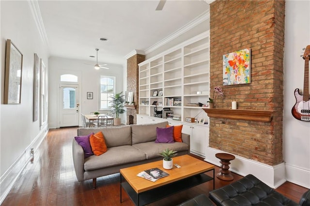 living room featuring ceiling fan, wood-type flooring, and ornamental molding