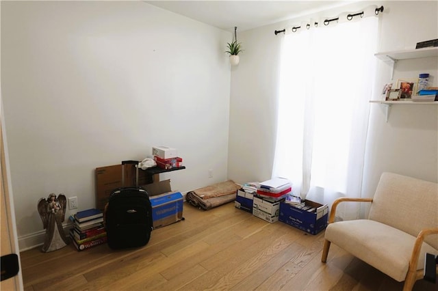 interior space with hardwood / wood-style floors