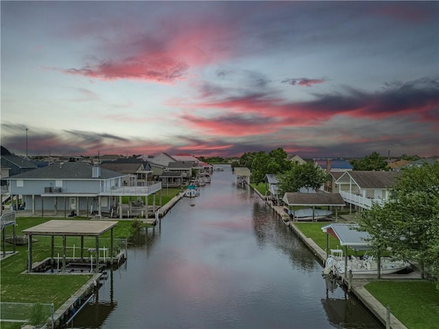 property view of water featuring a boat dock