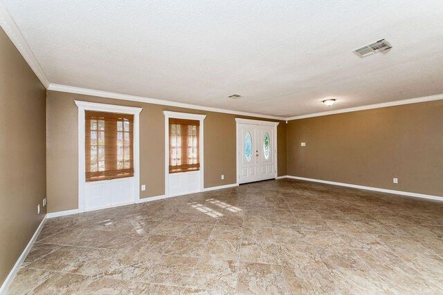 3412 Tolmas Dr, Metairie, LA 70002 - empty room with crown molding, baseboards, and a textured ceiling