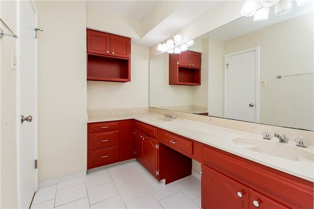 3412 Tolmas Dr, Metairie, LA 70002 - full bathroom featuring double vanity and tile patterned flooring