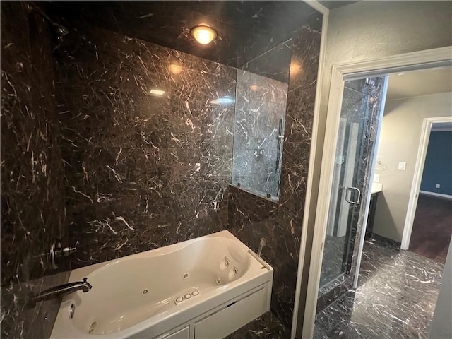 bathroom with separate shower and tub