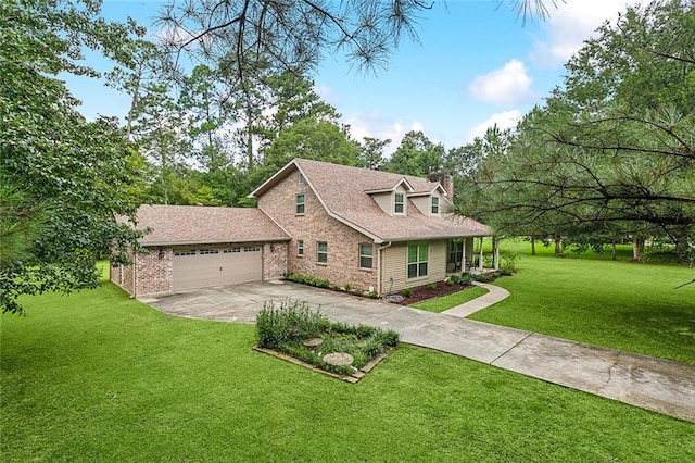 new england style home with a garage and a front yard