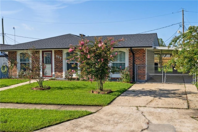 ranch-style home with a front lawn