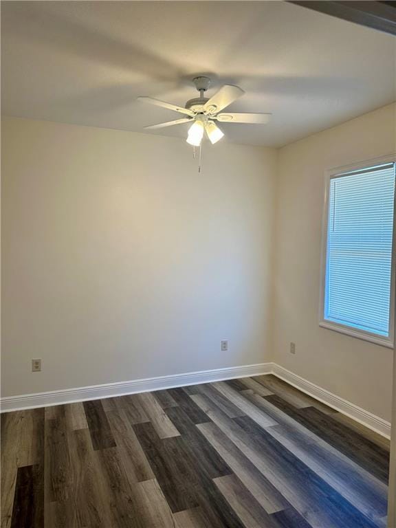 unfurnished room featuring ceiling fan and hardwood / wood-style flooring