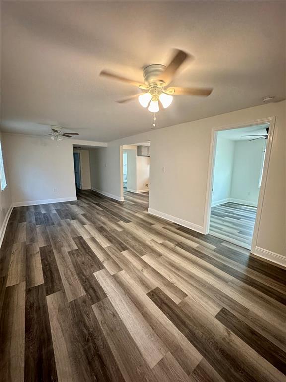 interior space featuring ceiling fan and hardwood / wood-style floors