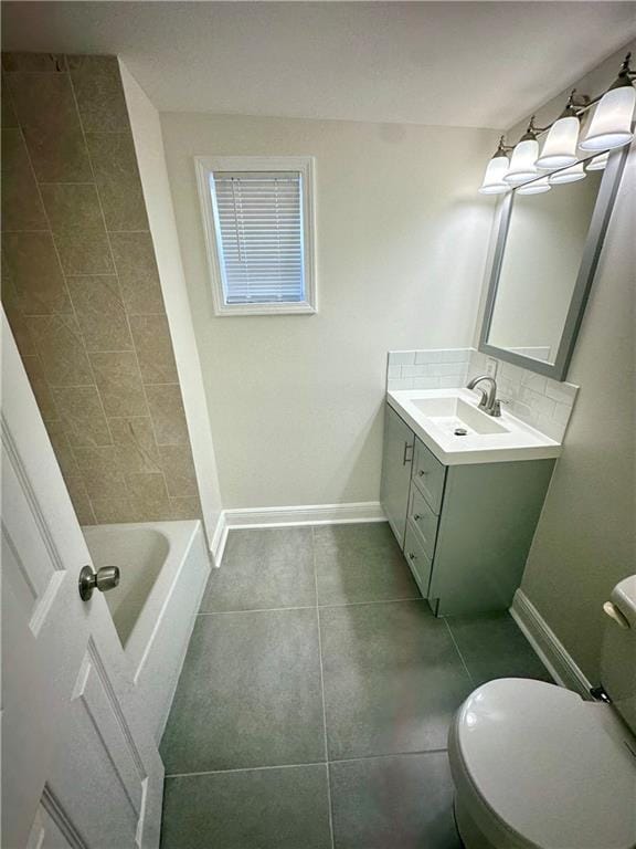 full bathroom with bathtub / shower combination, vanity, tile patterned flooring, and toilet