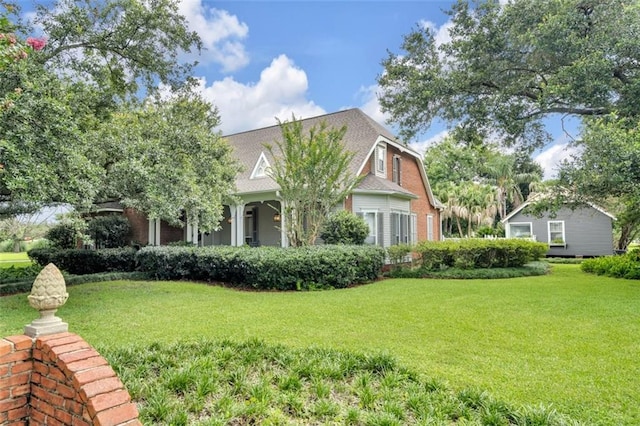 view of front of property with a front lawn