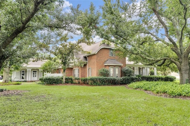 view of front of home with a front yard