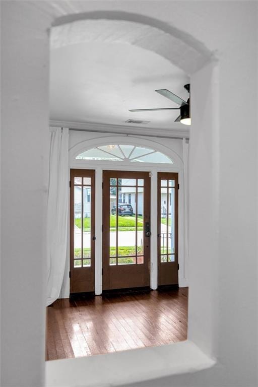 entryway with ceiling fan and dark hardwood / wood-style floors