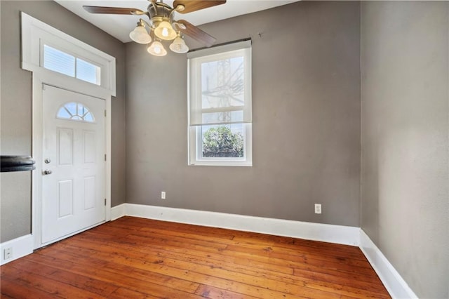 entrance foyer featuring plenty of natural light, ceiling fan, and hardwood / wood-style flooring