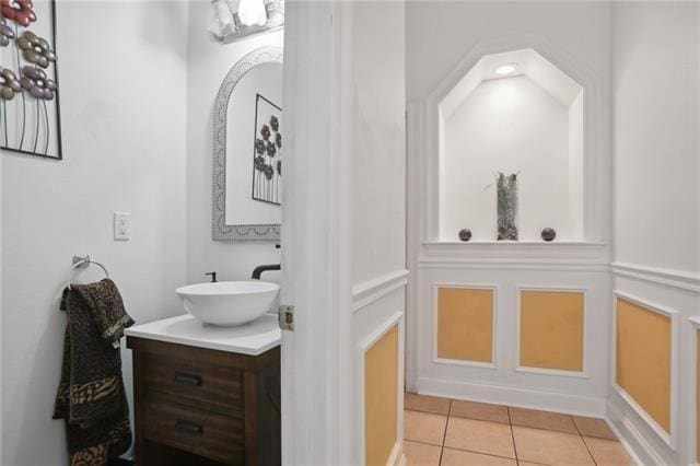 bathroom with vanity and tile patterned flooring